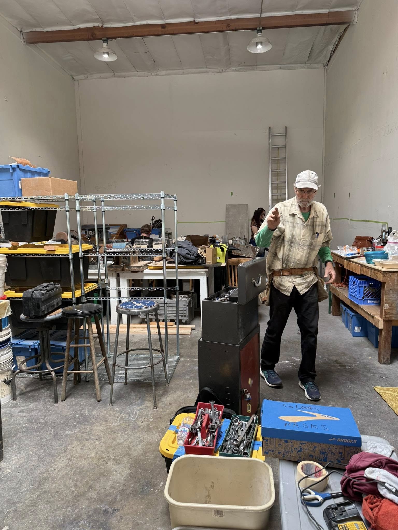 Member working on setting up new workshop space.