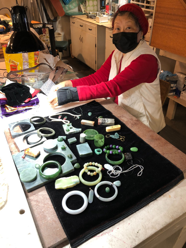 Club member working on lapidary and beading projects.